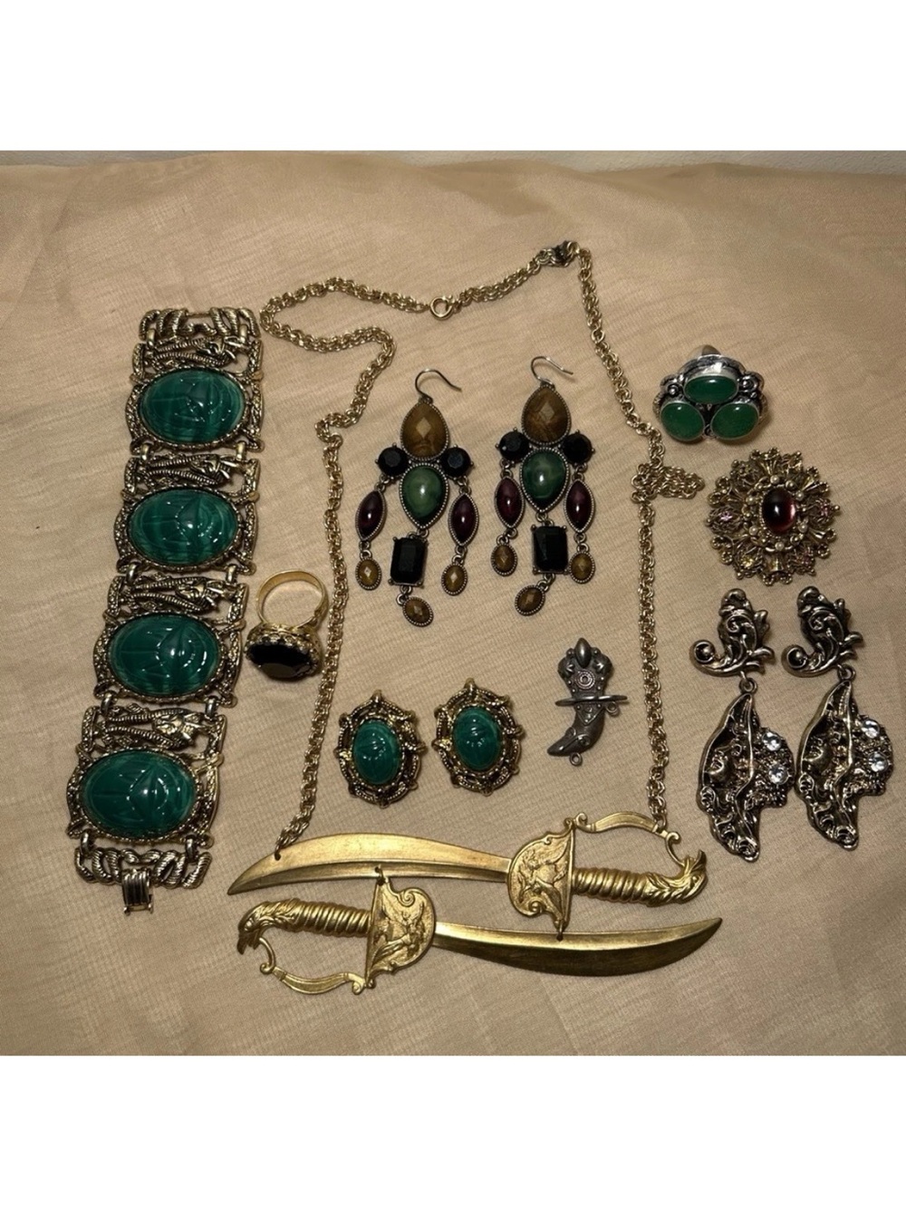 Jewelry Lot Egyptian Revival, Sword Necklace, And More